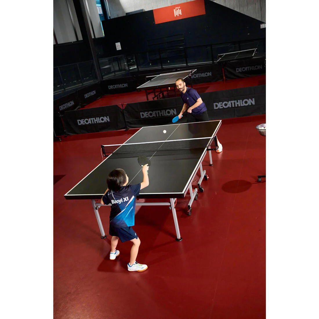 Mesa de ping-pong de interior compacta con una red innovadora, TTT 130.2 Negro - Image 15